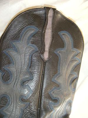 Black top, grey eel skin, blue stitching